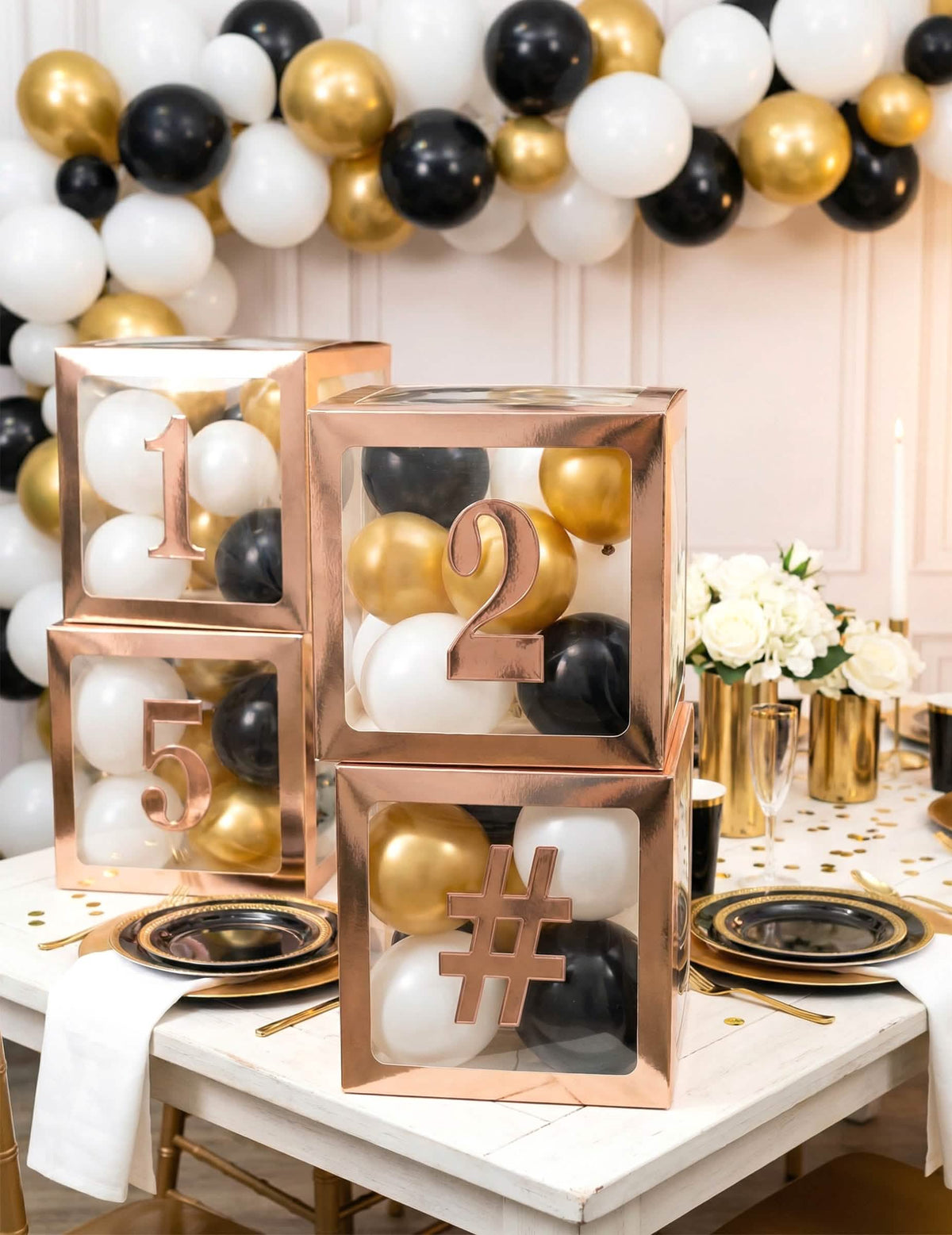 Mise en situation sur boîtes à ballons des 12 stickers chiffres adhésifs pour décoration de fête rose gold
