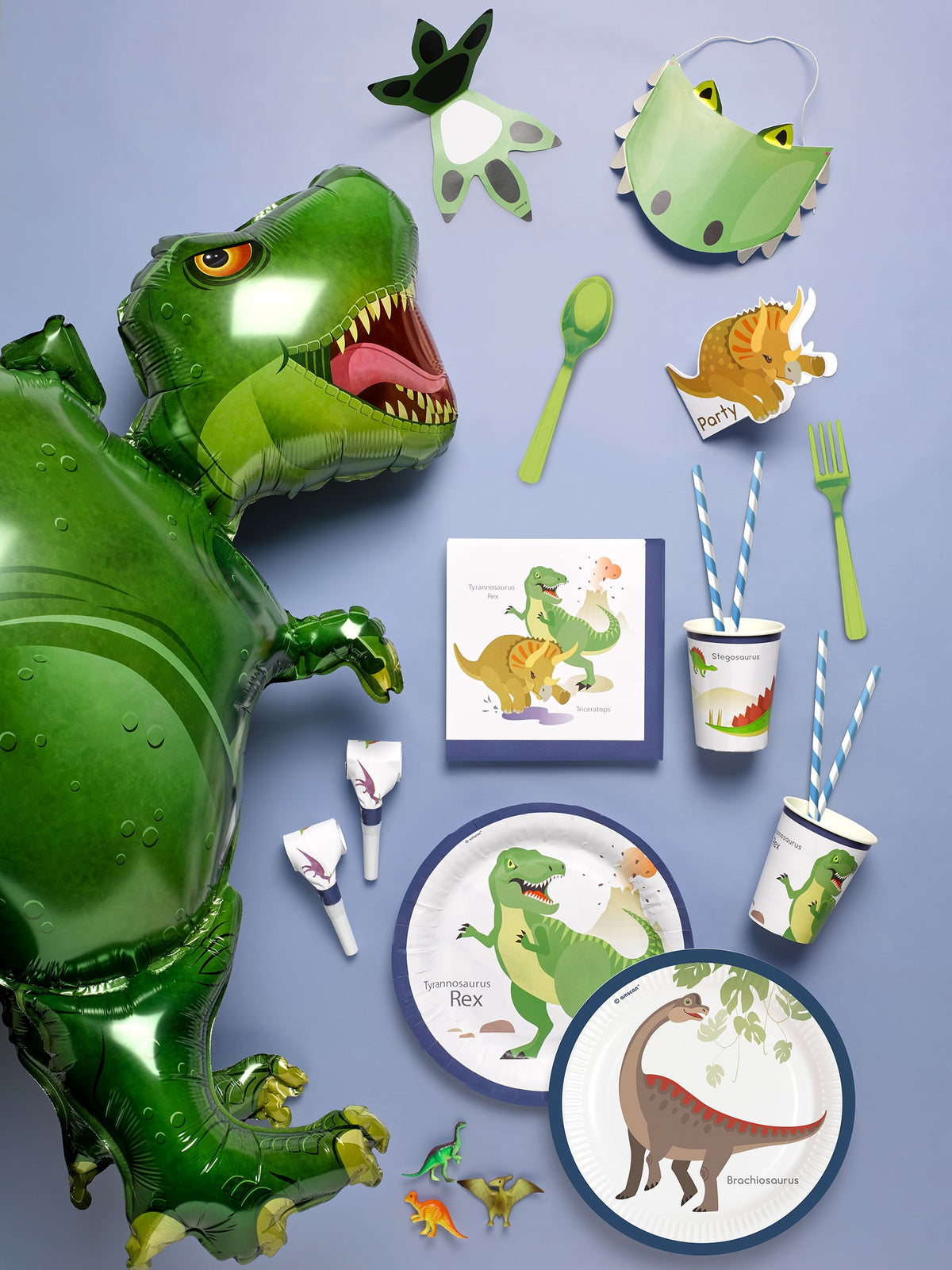 Vue d'ensemble avec décoration de fête des serviettes en papier grands dinosaures