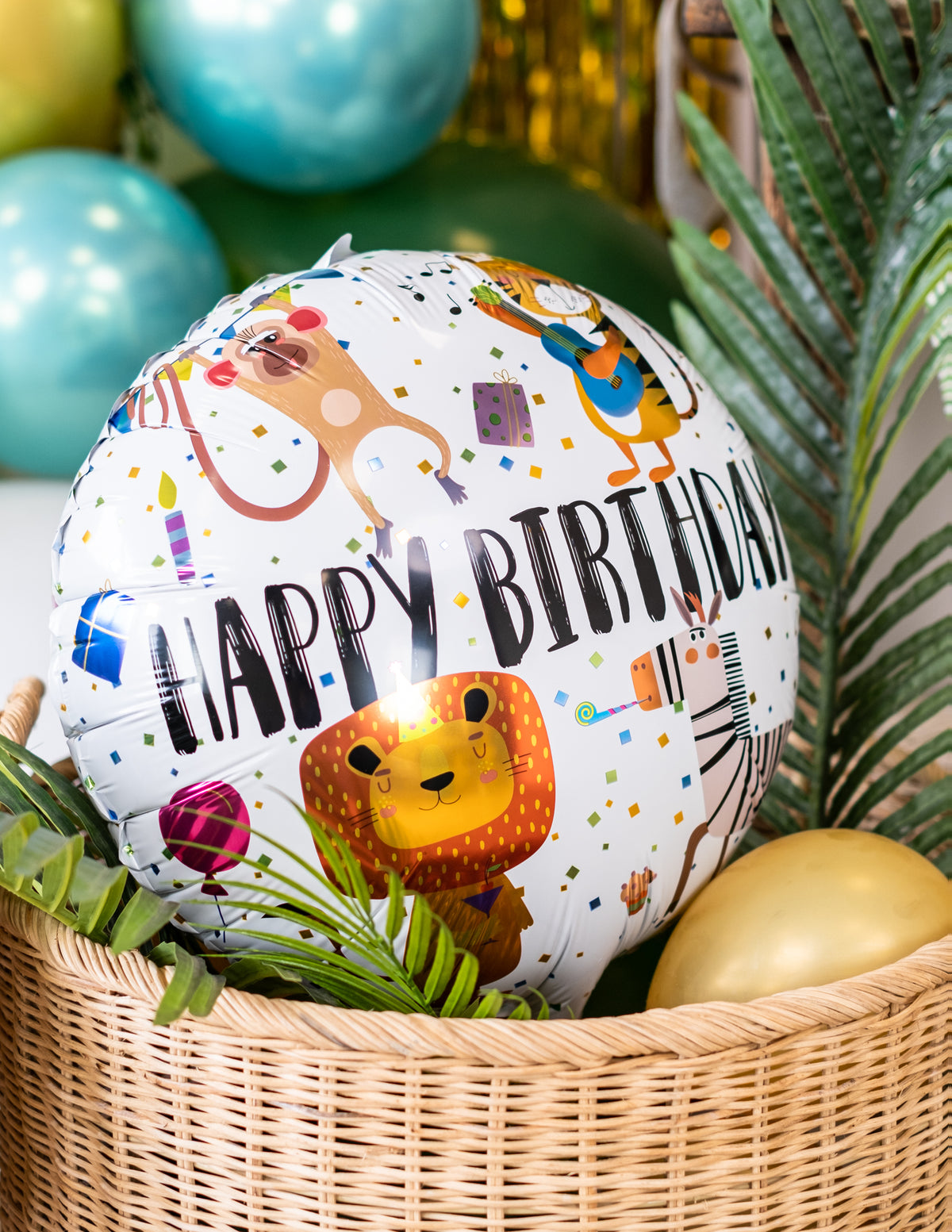 Gros plan sur les illustrations du ballon aluminium Happy Birthday animaux