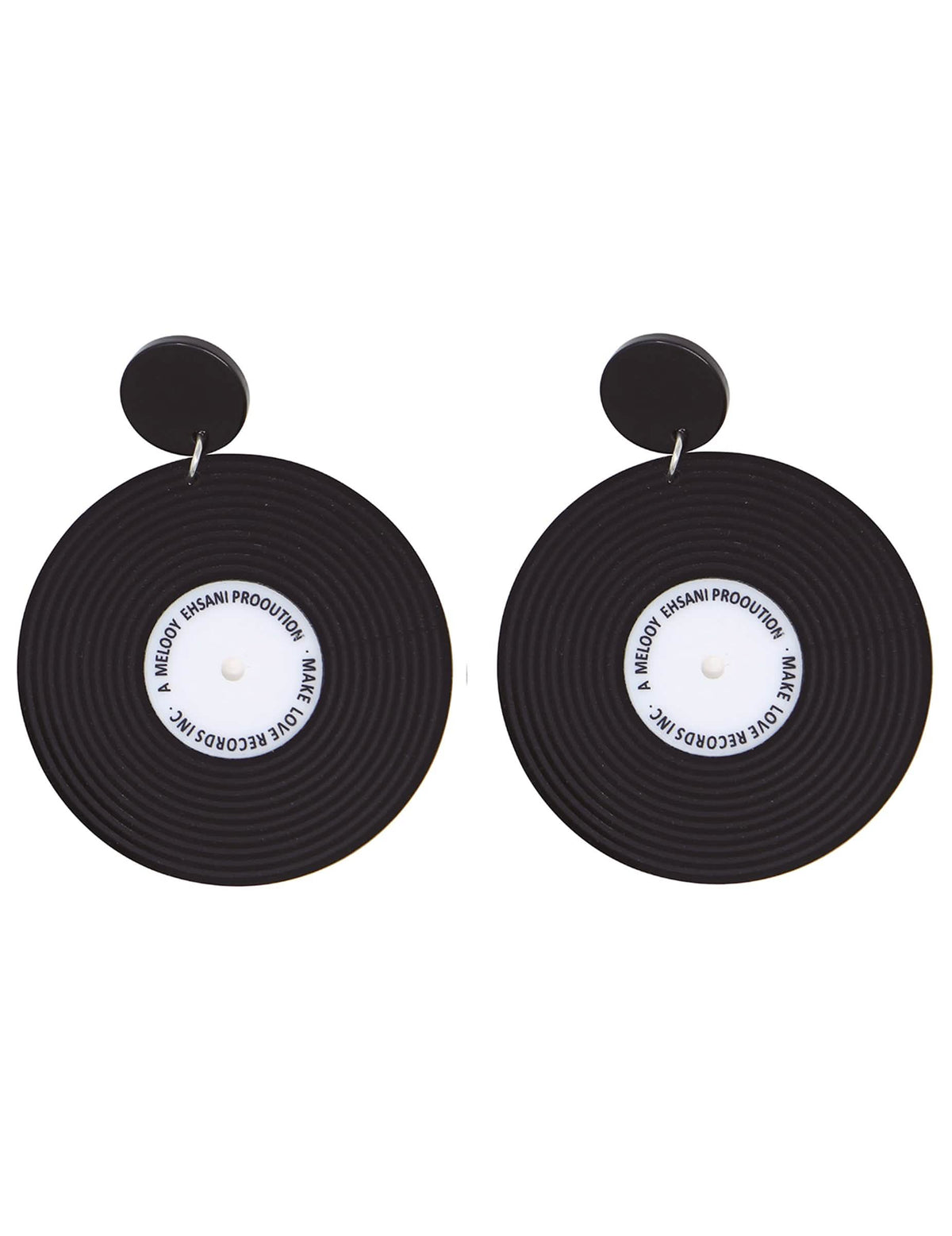 Gros plan sur la paire de boucles d'oreilles disques vinyles rétro