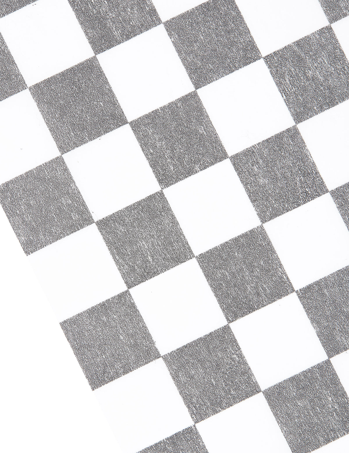 Détail du motif du chemin de table intissé damier
