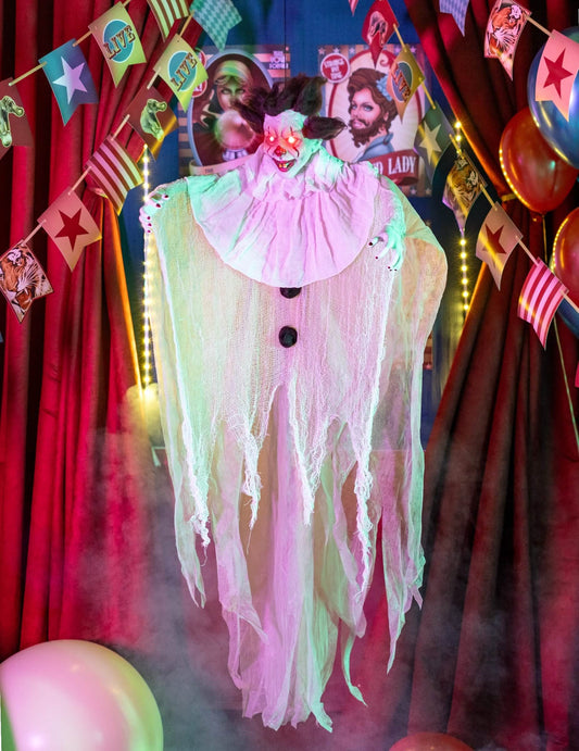 Mise en scène avec yeux lumineux de la décoration à suspendre clown tueur