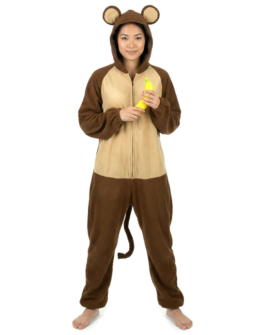 Banane tenue à la main du déguisement de singe