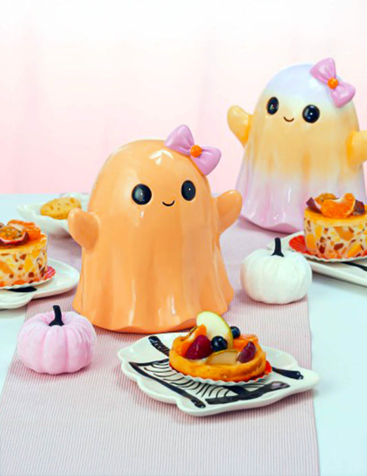 Fantasma sorridente em resina laranja pastel 20 cm