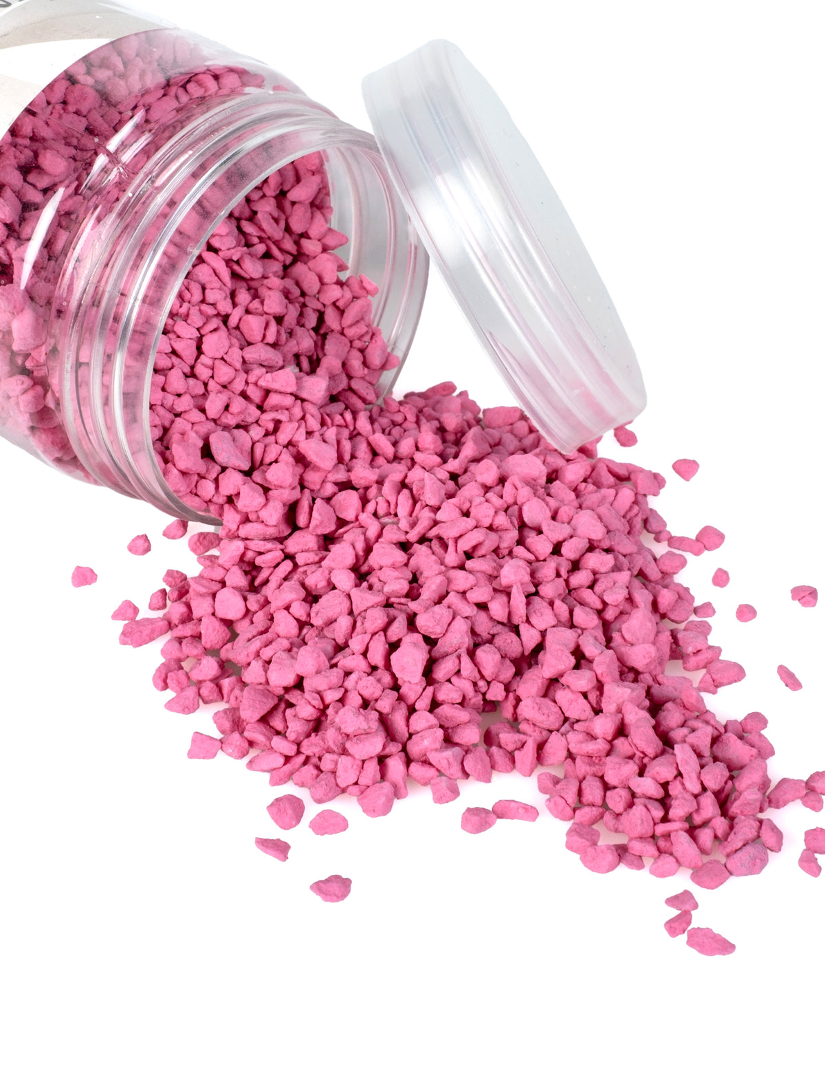 Vue du pot renversé des gravillons décoratifs fuchsia
