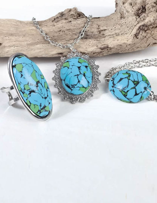 Vue rapprochée des bijoux du kit création de bijoux parure pierres turquoises la divine