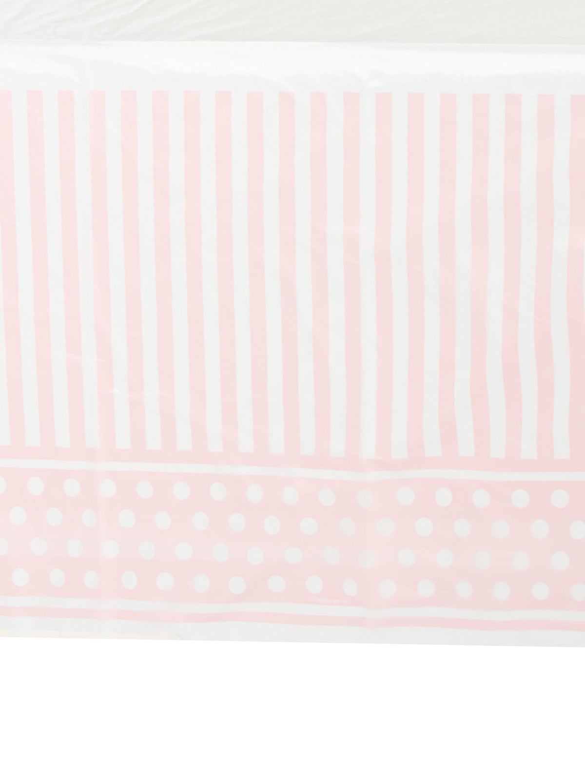 Détail des motifs de la nappe en plastique rayé et à pois pour fête rose et blanc