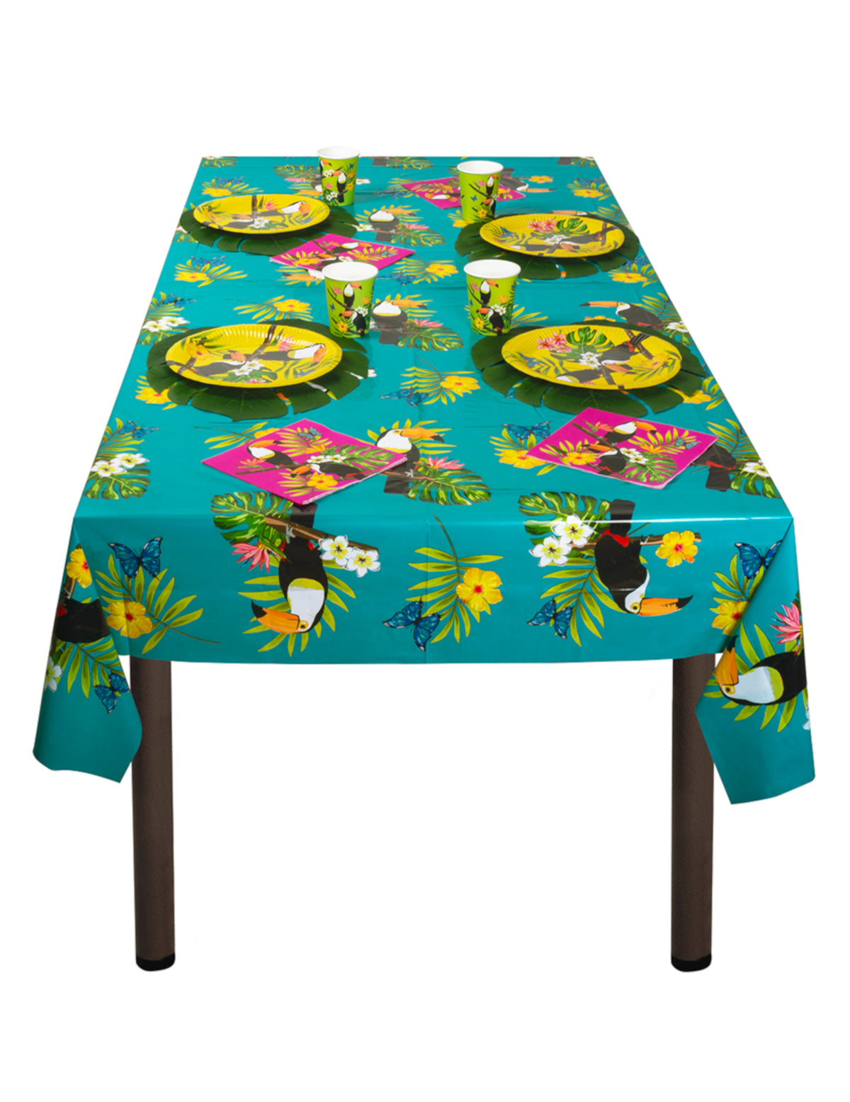 Mise en situation sur une table de fête de la nappe en plastique toucan