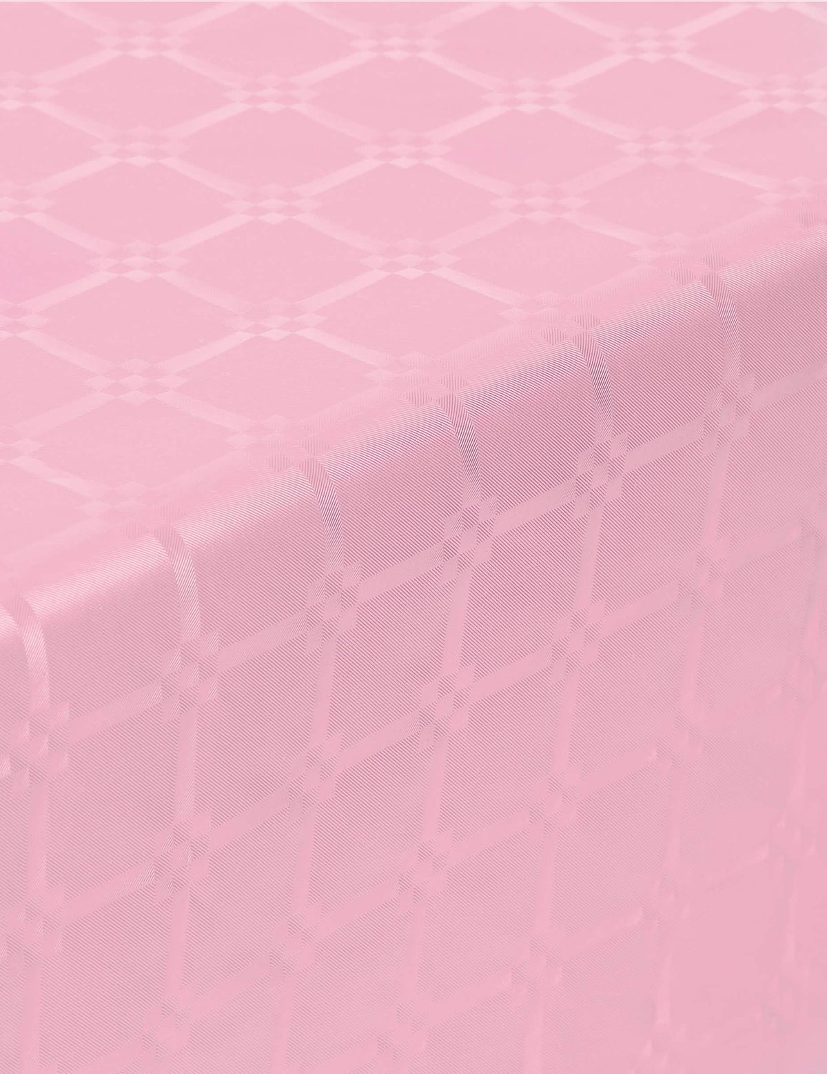 Detalhe dos motivos da toalha de mesa em rolo de papel damasco cor de rosa pastel