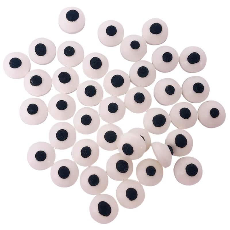 Grande plano da decoração comestível pequenos olhos de açúcar