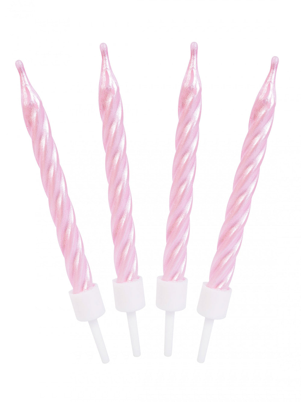 Gros plan des bougies d'anniversaire spirales roses nacrées