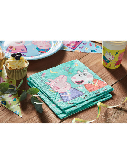 Mise en scène sur une table de fête des serviettes en papier Peppa Pig