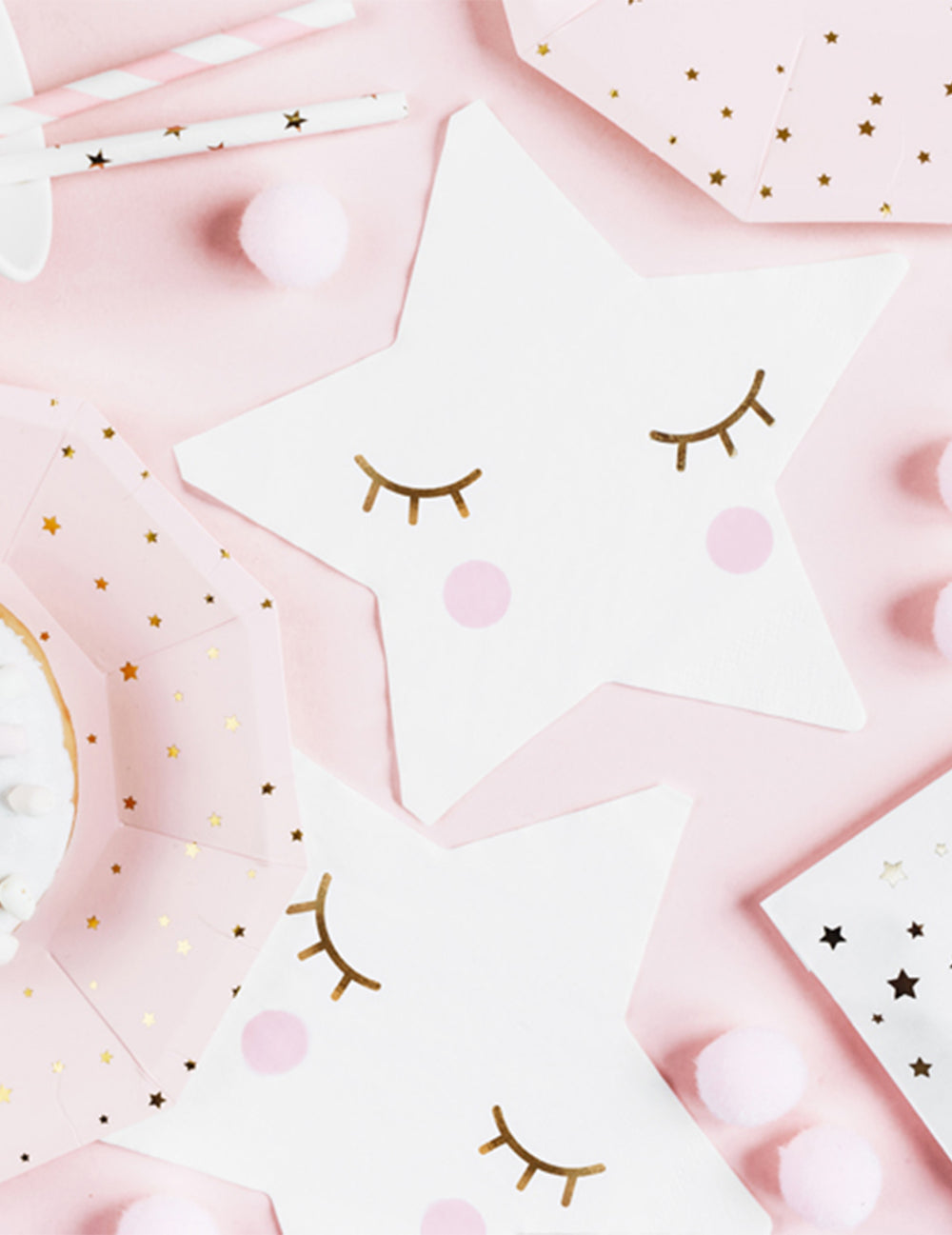 Détail du motif visage des serviettes en papier petite étoile blanche aux yeux dorés