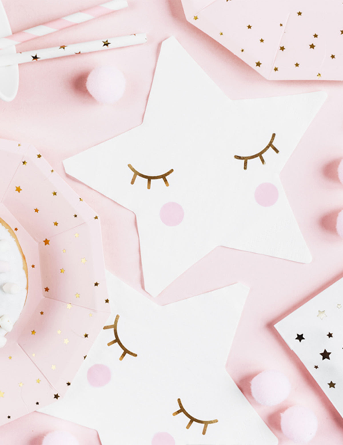 Détail du motif visage des serviettes en papier petite étoile blanche aux yeux dorés