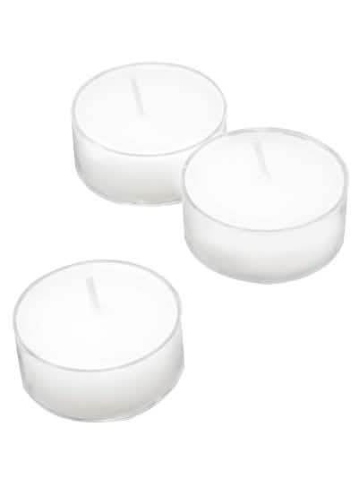 velas de chá brancas com suporte transparente