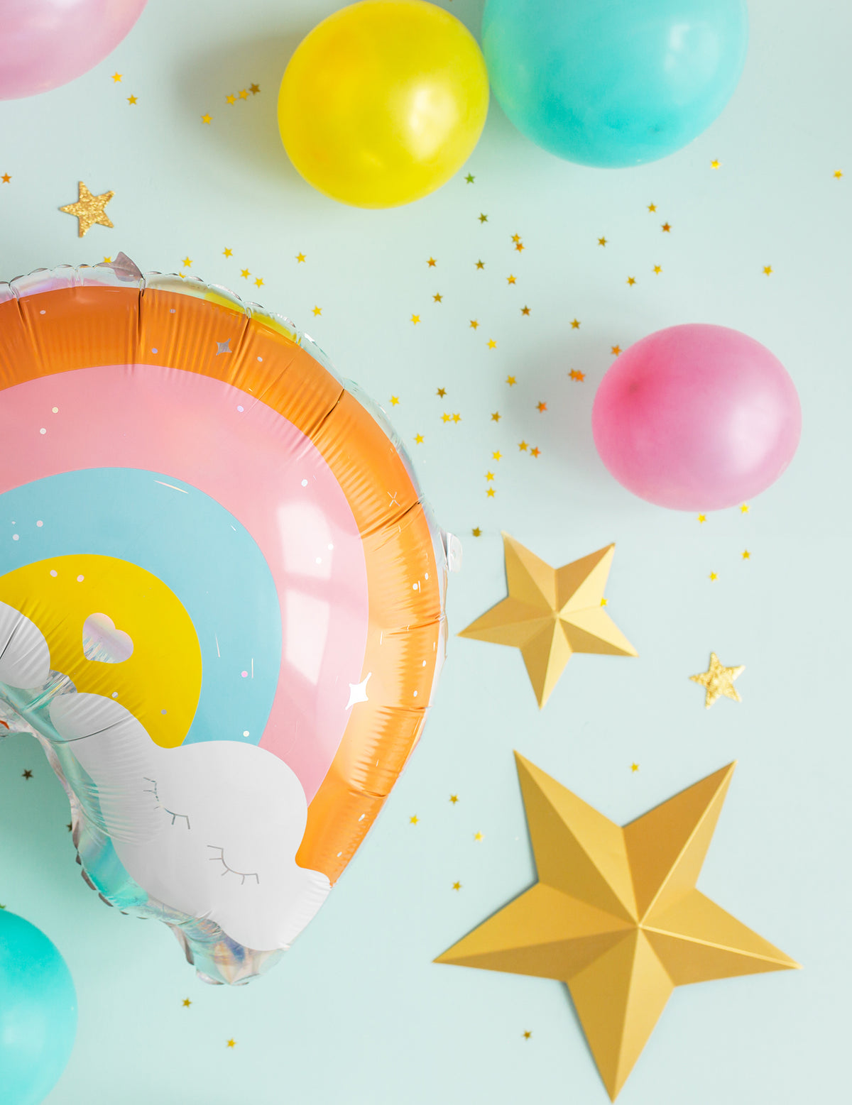 Ambiance avec ballon arc-en-ciel et confettis de l'Etoile à suspendre 3D Noël