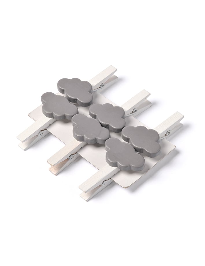 Vue de dessus du lot de pinces nuage pour décoration grises en bois blanc