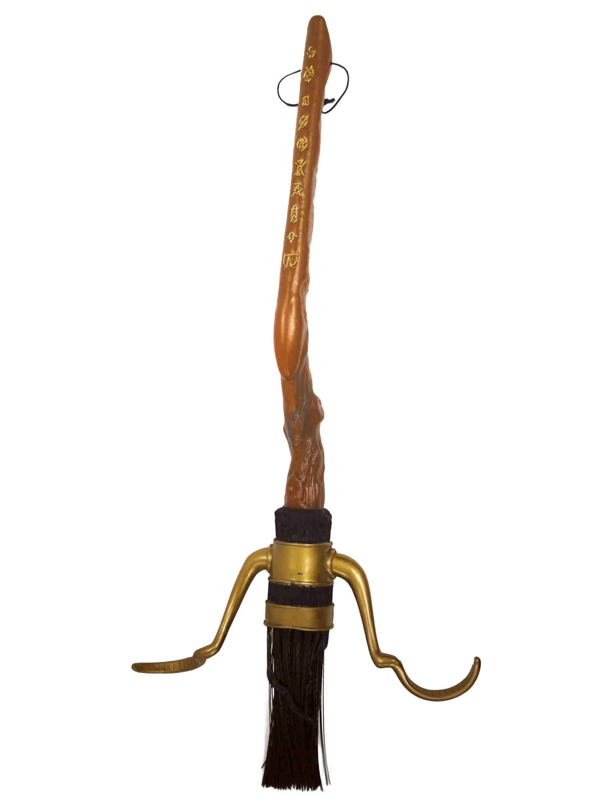 Grande plano dos apoios para os pés dourados e dos pelos da vassoura Nimbus luxo Harry Potter