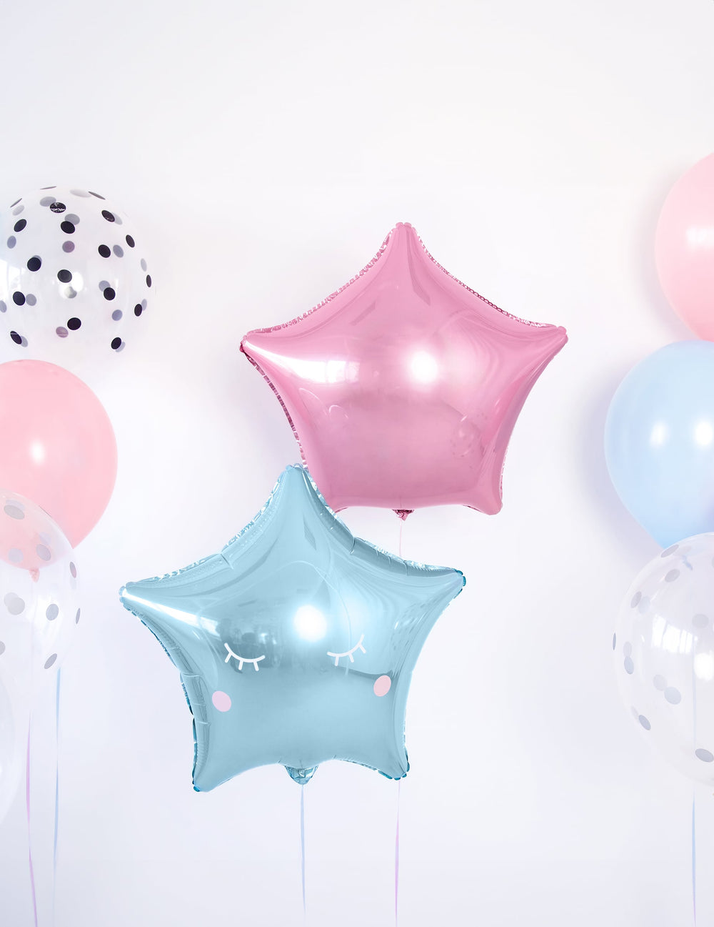 Mise en scène du ballon aluminium étoile rose pastel