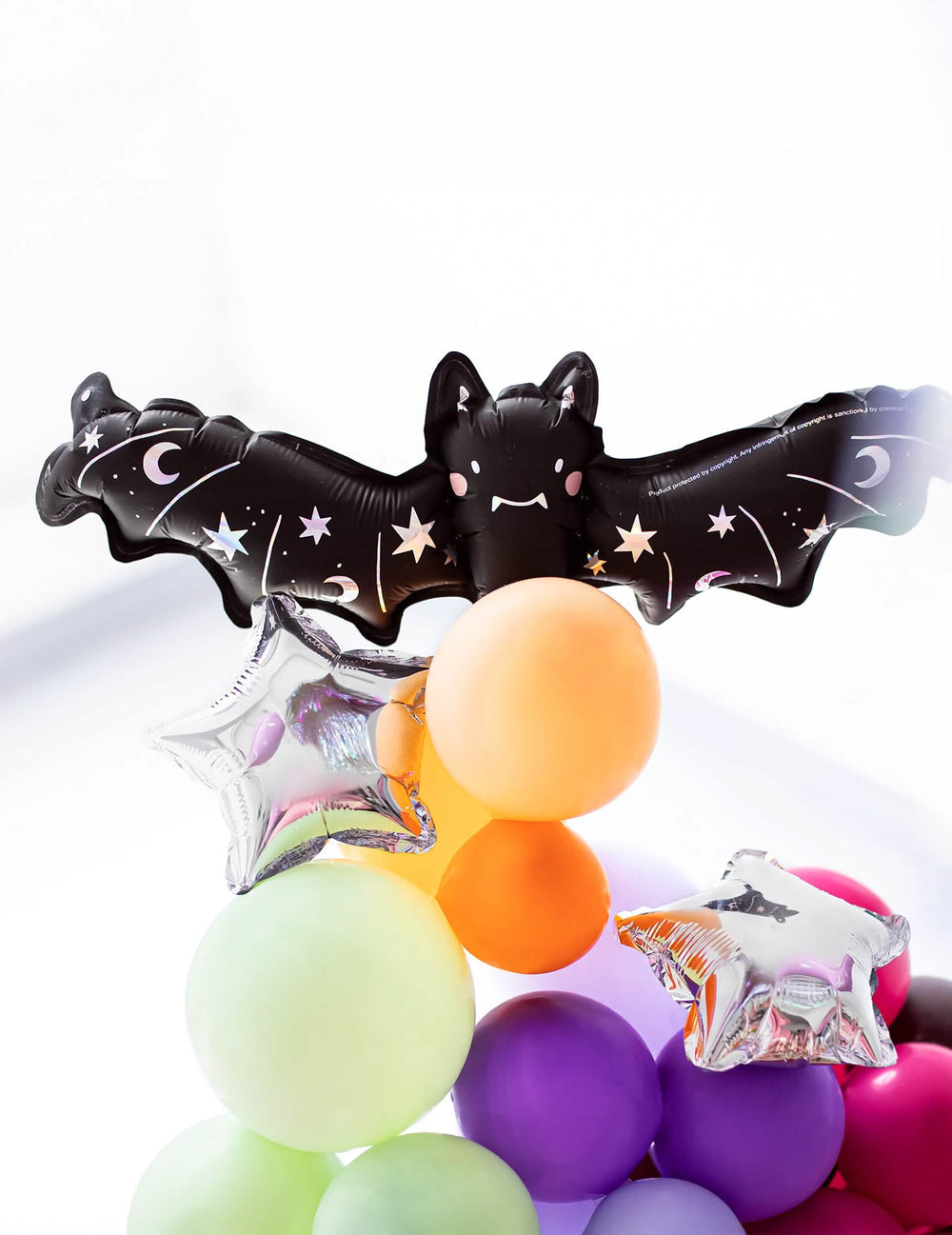 Ballon aluminium petite chauve-souris pour fête noir avec motifs étoiles et lunes