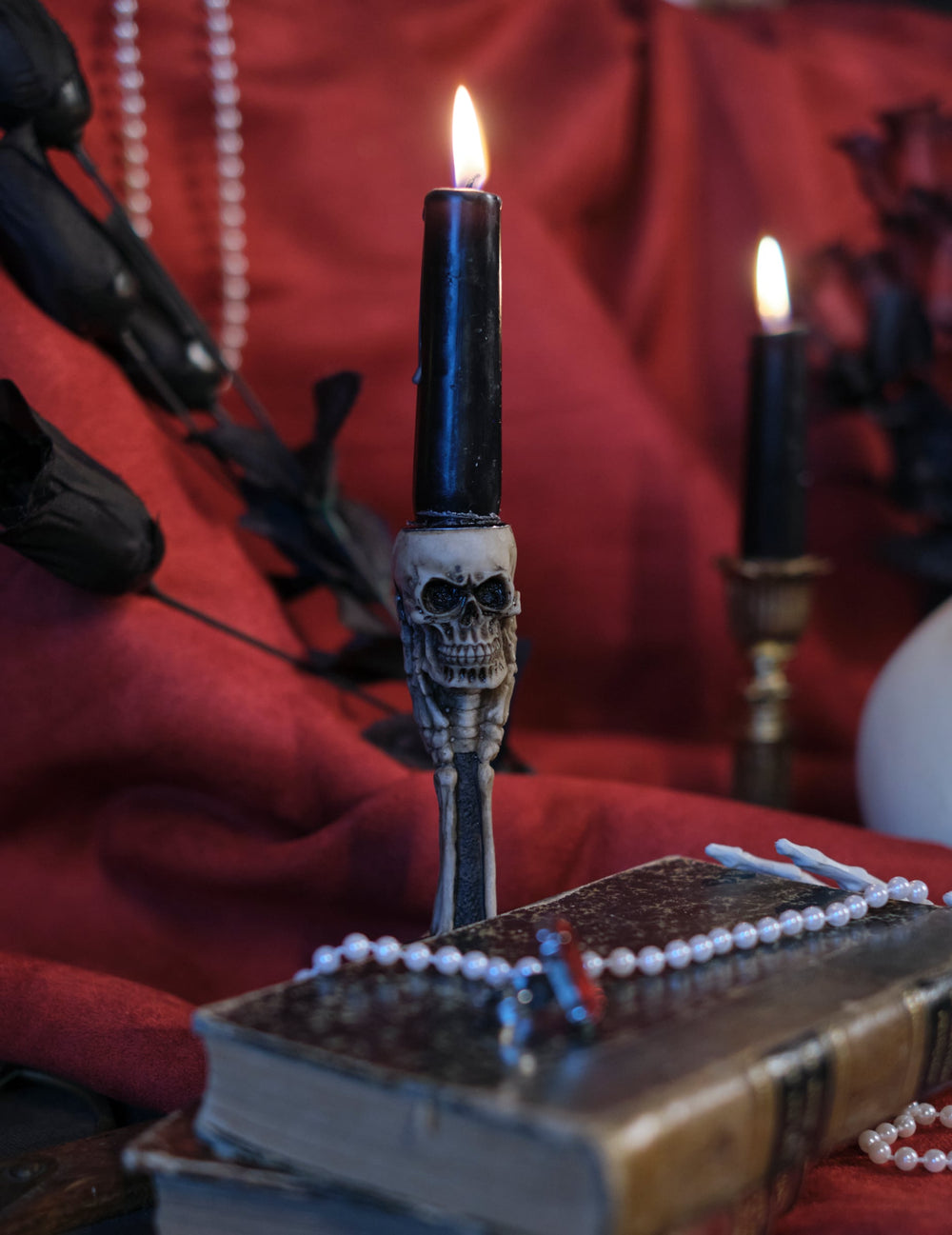 Bougeoir os et crânes pour décoration d'Halloween beige et noir