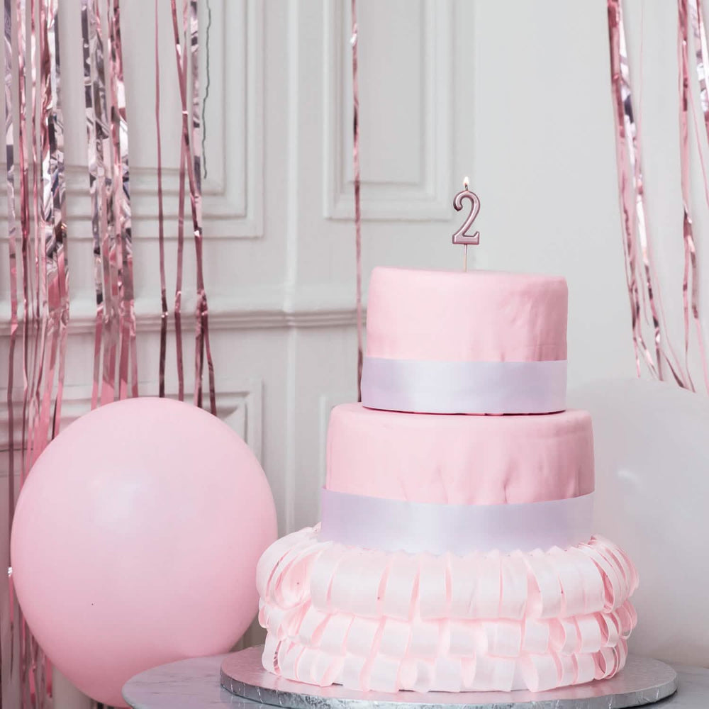 Vela de aniversário número 2 em ouro rosa com espeto