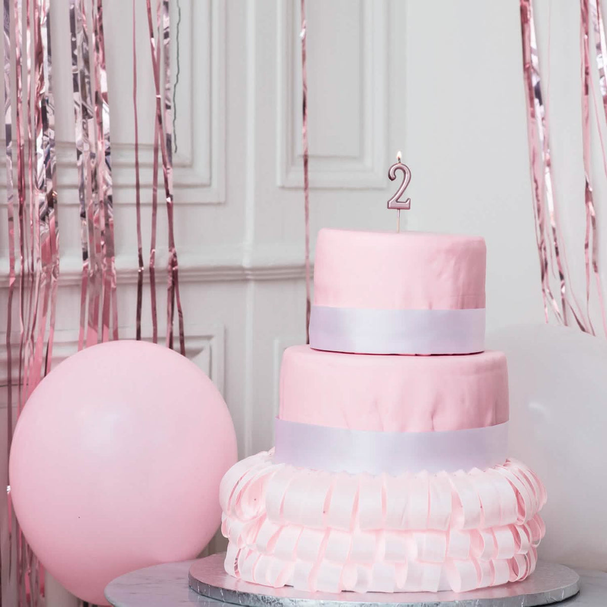 Vela de aniversário número 2 em ouro rosa com espeto