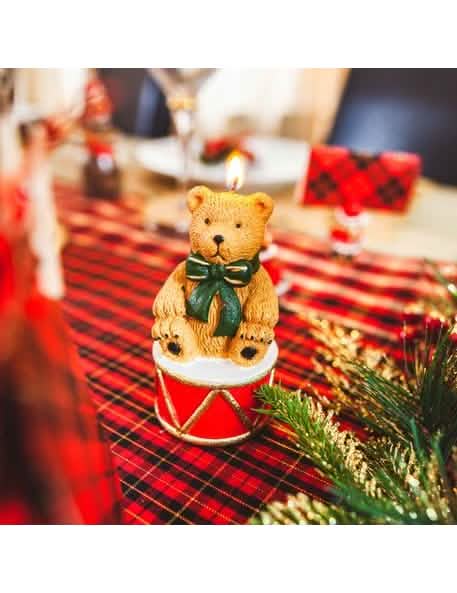 Situação da vela ursinho no seu tambor para decoração de natal