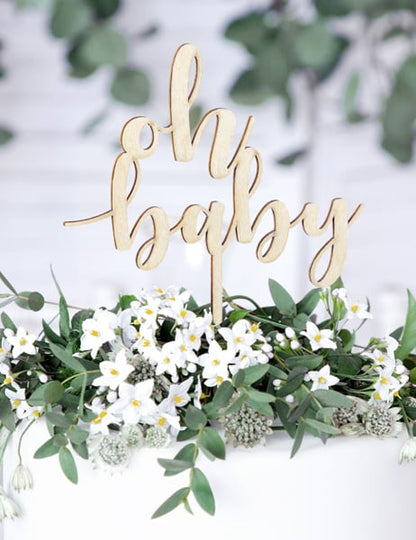 Mise en scène du cake topper oh baby pour baby shower