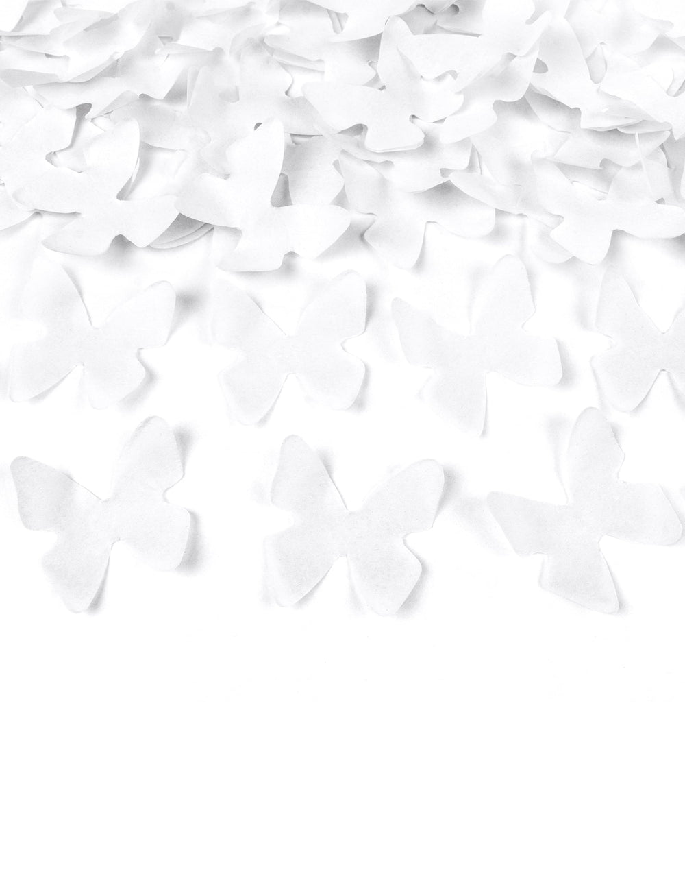 Détail des confettis en forme de papillons du canon à confettis papillons blancs