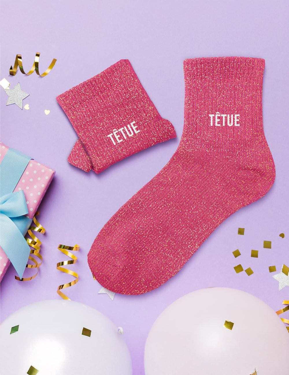 Mise en scène festive des chaussettes à paillettes Têtue pour femme