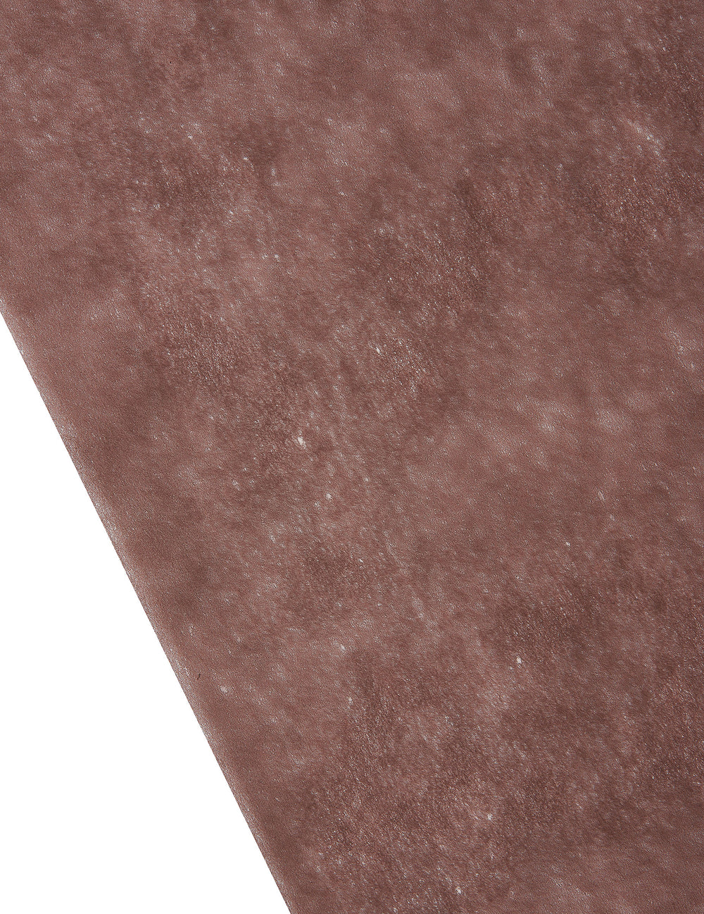 Gros plan sur la texture du chemin de table intissé décoration festive marron