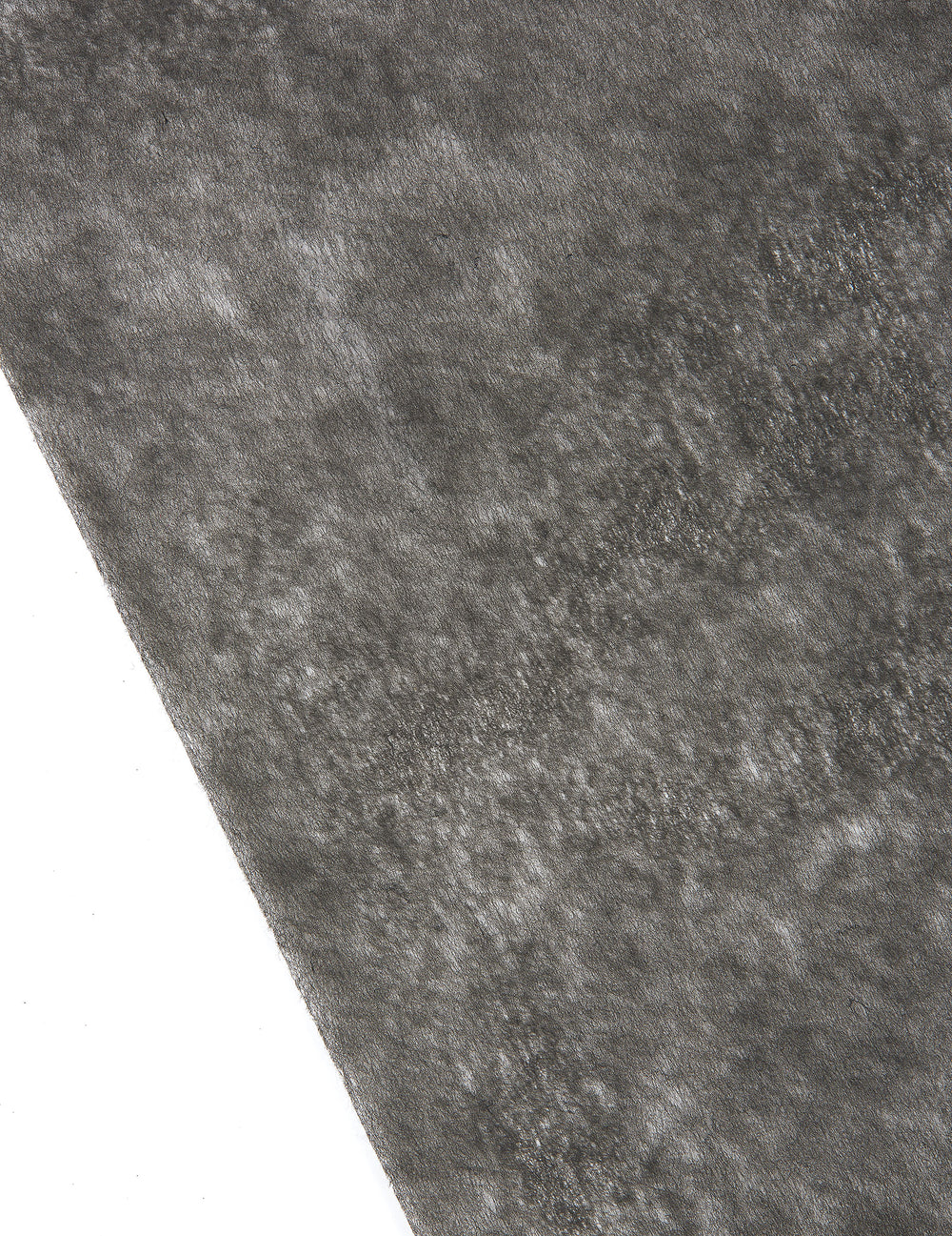 Gros plan sur la texture du chemin de table intissé pour décoration de fête noir