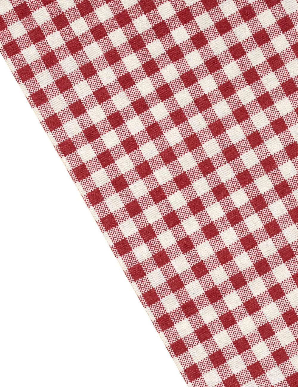 Grande plano do padrão aos quadrados do caminho de mesa em linho vichy
