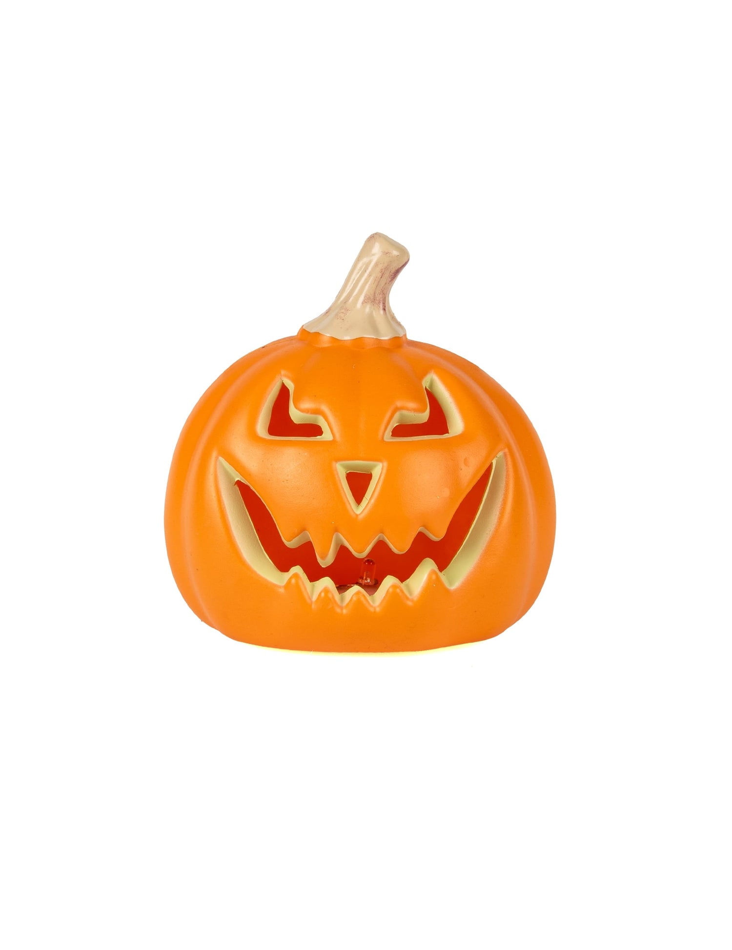 Citrouille lumineuse d'Halloween orange avec visage grimaçant