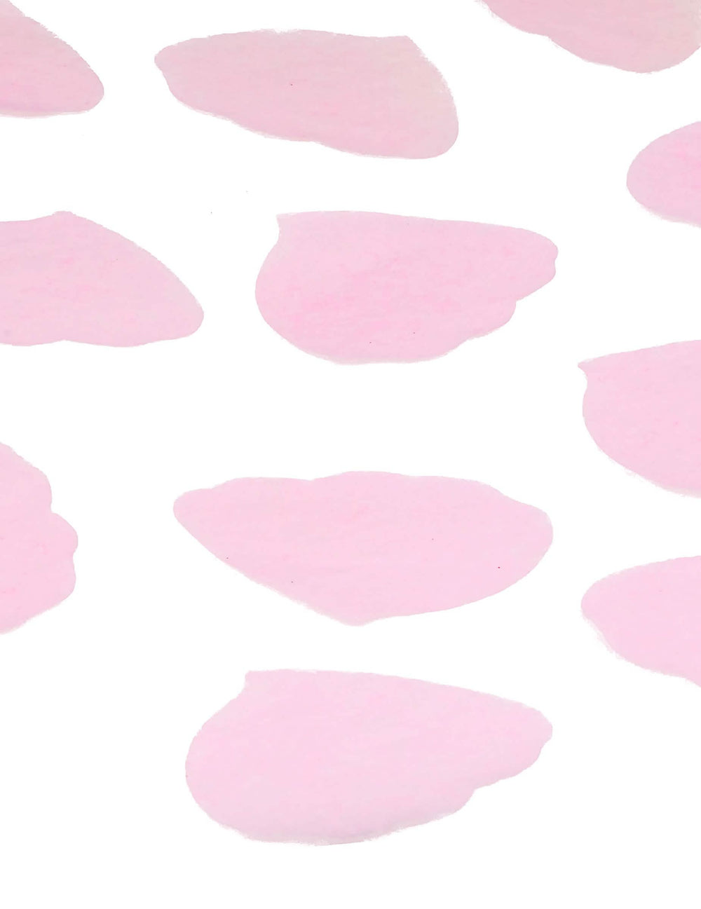 Grande plano da textura dos confettis pétalas de cor de rosa em papel para casamento