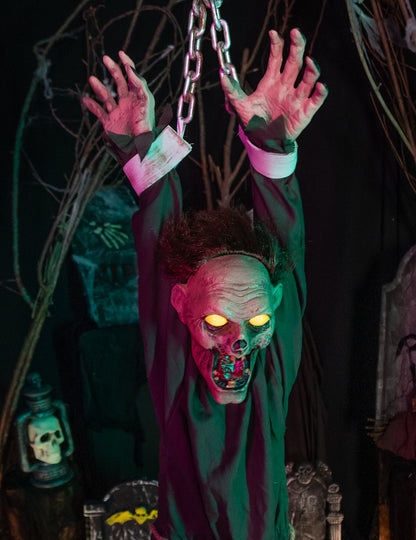 Decoração Zumbi Animada Acorrentada 1,4m