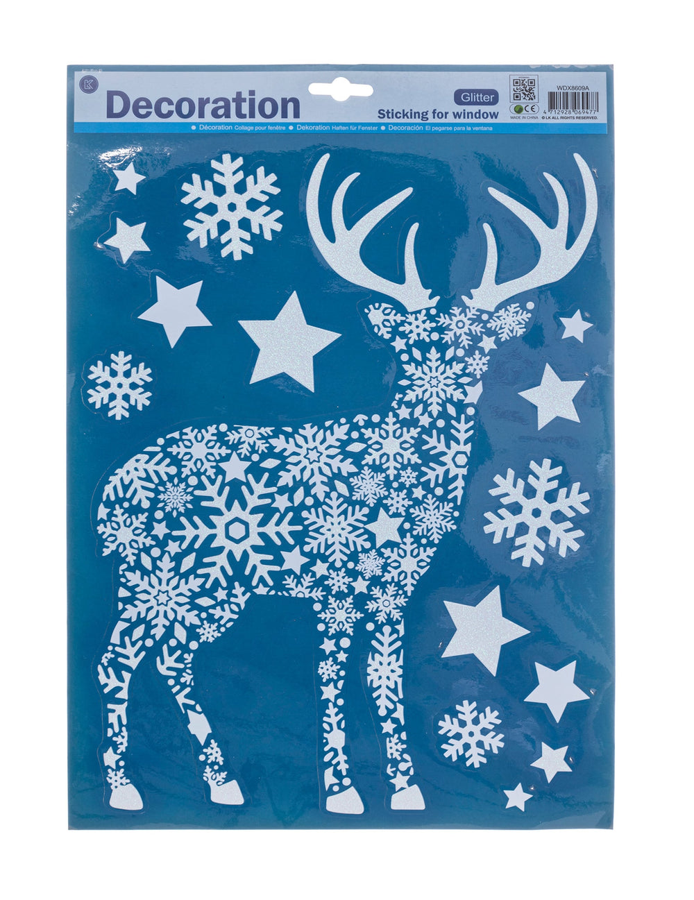 Gros plan sur le motif renne de la décoration pour vitres sapin et renne