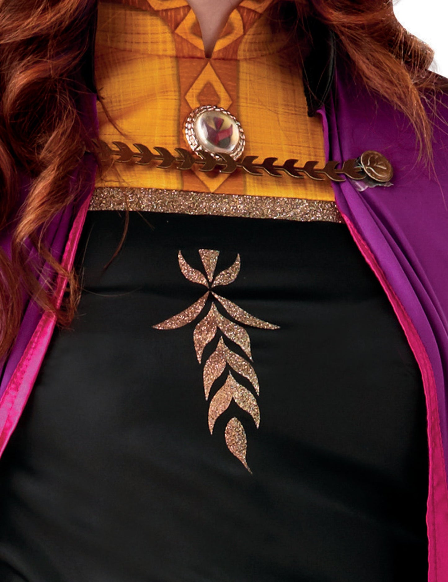 Détail du buste et du motif pailleté du déguisement Anna La reine des neiges 2