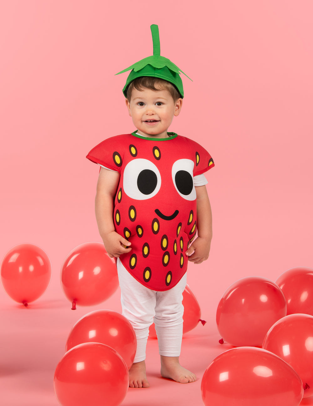 Vue de face du déguisement petite fraise pour enfant