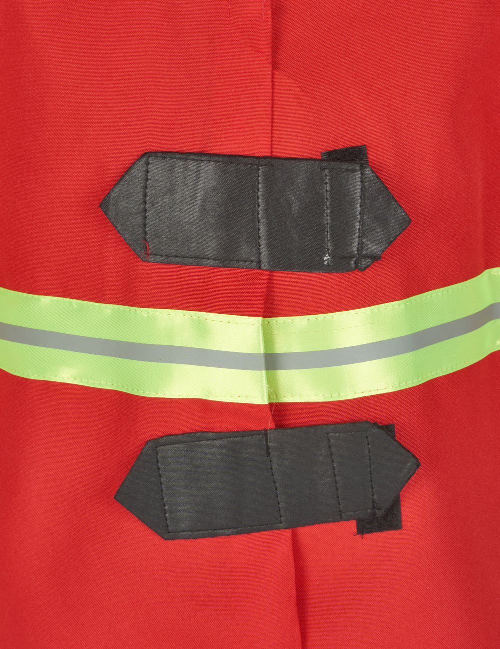 Détail des attaches et de la bande réfléchissante du déguisement de pompier pour enfant