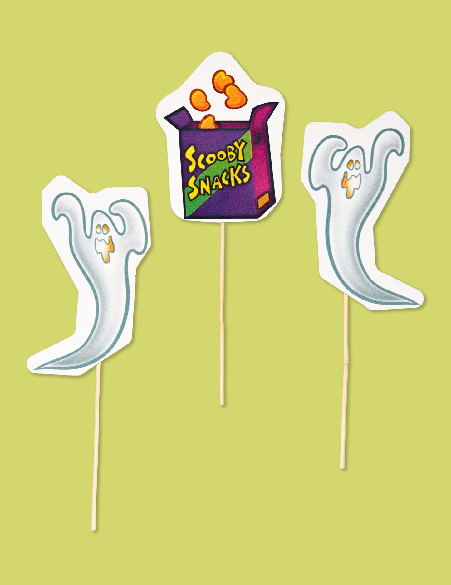 Accessoires sur tige fantômes et Scooby Snacks du kit photobooth avec cadre Scooby-Doo