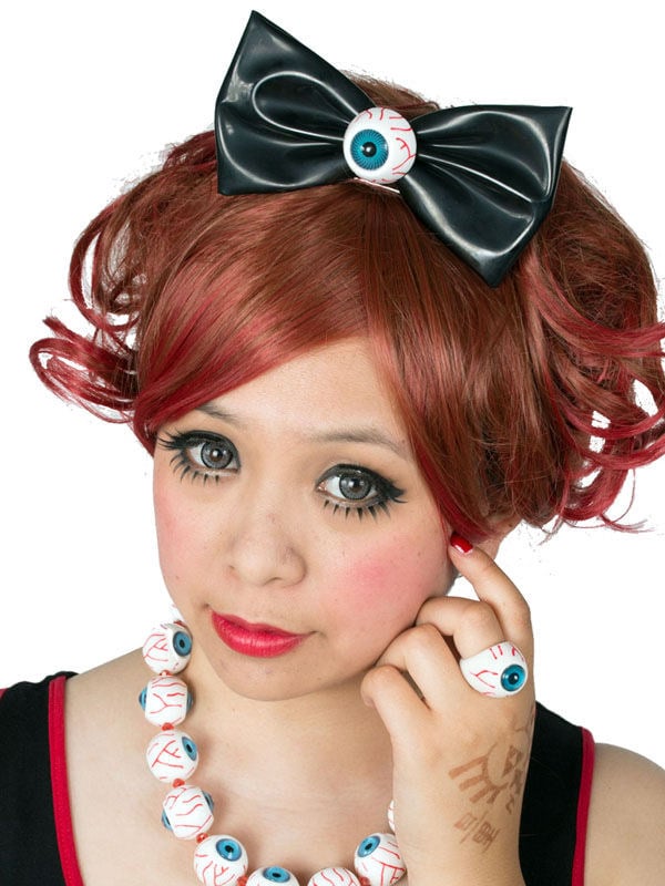 Pince à cheveux Kreepsville Gothic avec noeud et oeil pour femme noir