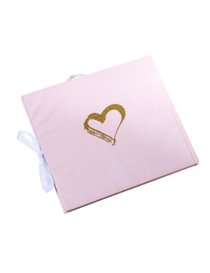 Détail du cœur doré pailleté sur la couverture du Livre d'or Mlle devient Madame