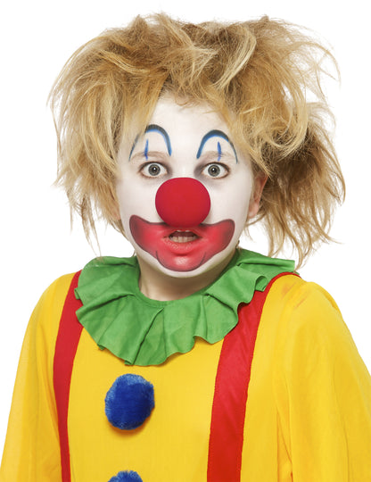 Portrait de face du maquillage crayons de clown pour enfant
