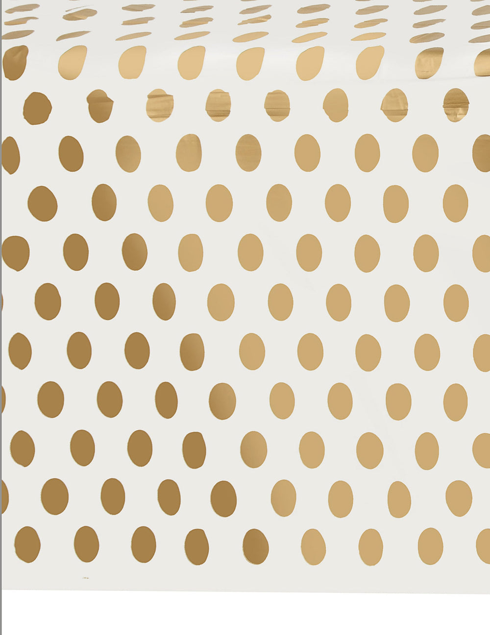 Détail du motif de la nappe en plastique à pois dorés pour fête et anniversaire