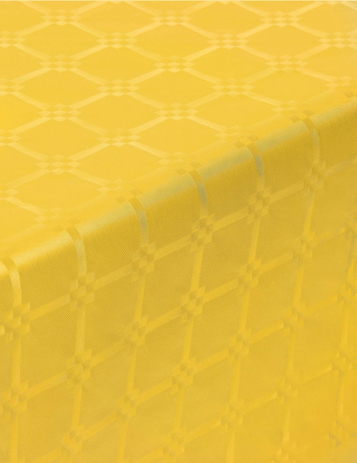 Grande plano sobre o padrão da toalha de mesa em rolo de papel damasco amarelo