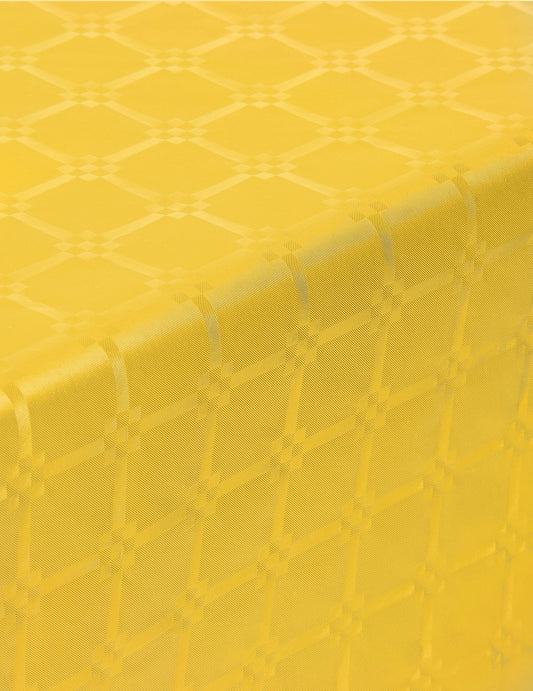 Gros plan sur le motif de la nappe en rouleau papier damassé jaune