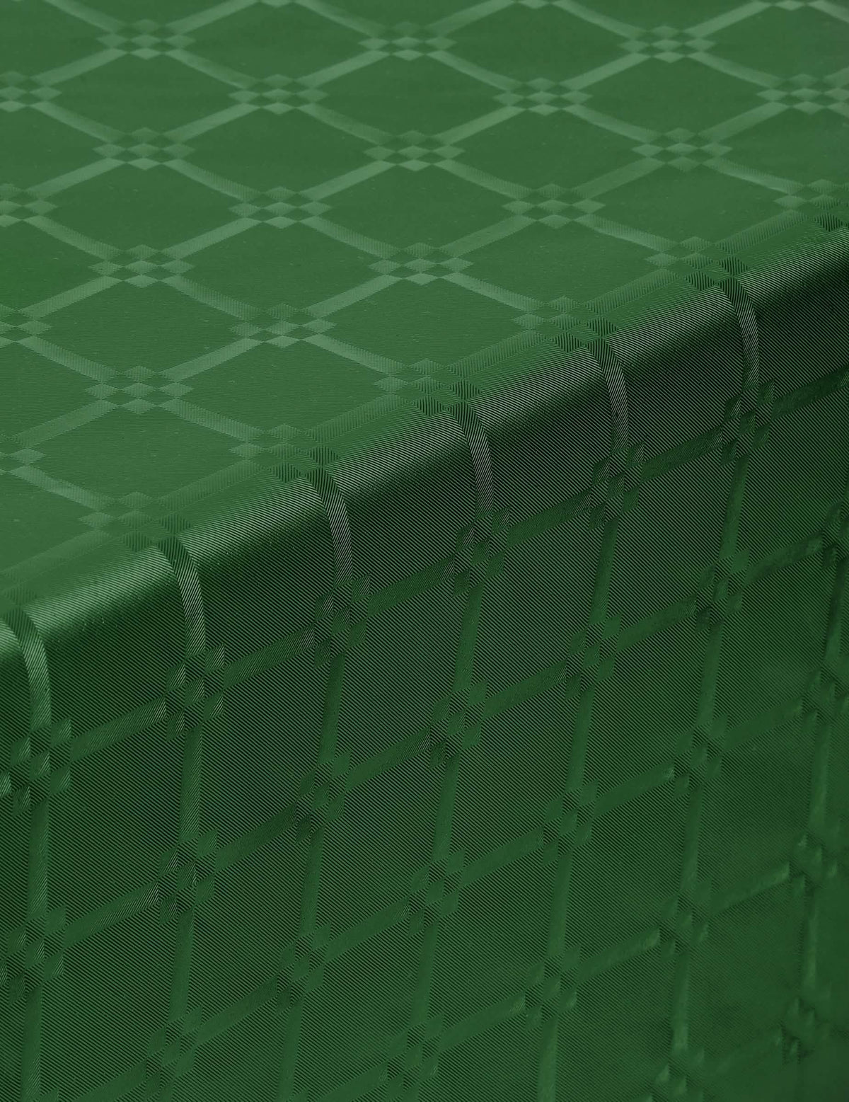 Detalhe da textura adamascada da toalha de mesa em rolo de papel adamascado para festa verde escuro
