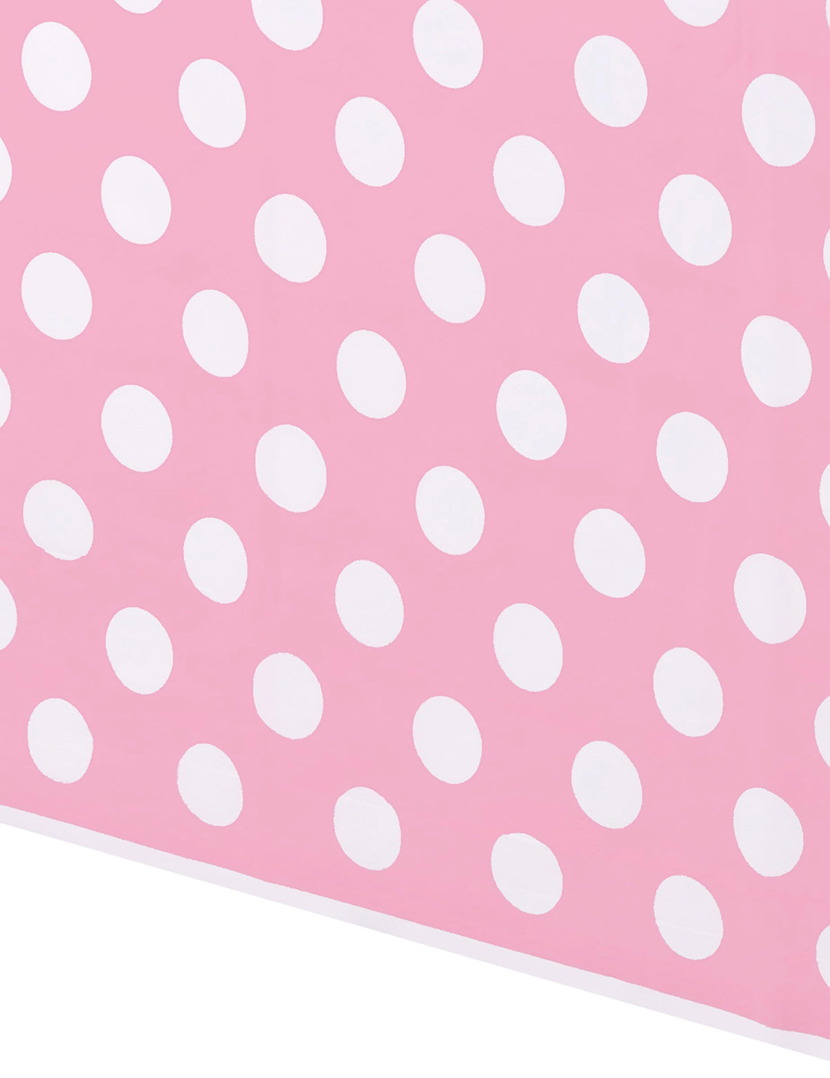 Détail du motif de la nappe décoration rétro rose à pois blancs en plastique